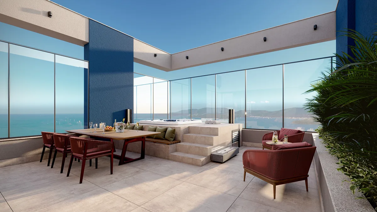Área externa do rooftop com spa e vista para o mar de Porto Belo